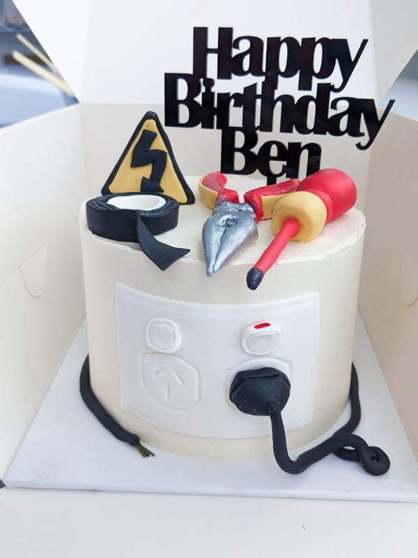 collegues birthday cake with tools on melbourne